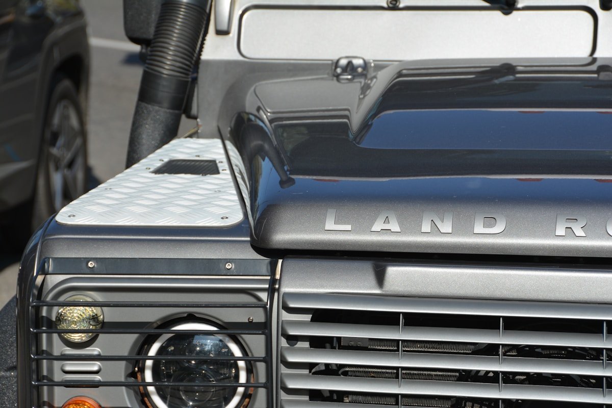Close-up of a dark grey land rover defender