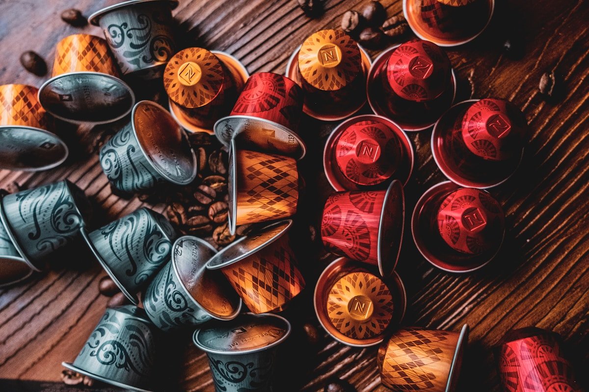 A bunch of different types of shoes on a table