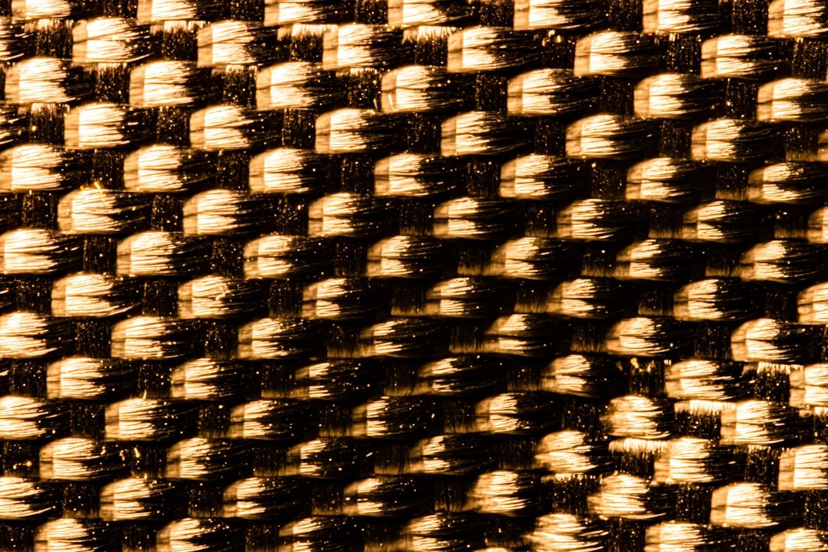 brown and black woven textile